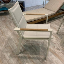 Load image into Gallery viewer, Hana Collection Stackable armless dining chair, powder-coated aluminum frame (available in 3 colors) and padded sling seats.  Beautiful, durable.  Maui Modern Home, Wailea, HI, Brown Jordan, Janus et Cie, Barlow Tyrie, High end outdoor furniture, Maui Modern Home, Wailea, HI