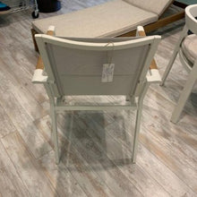 Load image into Gallery viewer, Hana Collection Stackable armless dining chair, powder-coated aluminum frame (available in 3 colors) and padded sling seats.  Beautiful, durable.  Maui Modern Home, Wailea, HI, Brown Jordan, Janus et Cie, Barlow Tyrie, High end outdoor furniture, Maui Modern Home, Wailea, HI