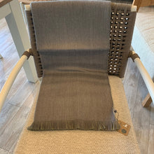 Load image into Gallery viewer, Featuring a soothing color palette of soft green and a light ash color, the Olive Branch reversible alpaca wrap has earthy comforts written all over it.Being wrapped in this beautiful accessory is like snuggling inside the comfiest cocoon, courtesy of a signature blend of alpaca fiber. Soft, lightweight, warm, and durable, this is an ultra-functional piece that would instantly give your wardrobe an upgrade. Material: 35% Baby Alpaca 35% Super Fine Alpaca 30% Acrylic Size: 27"x 76" Made in Peru