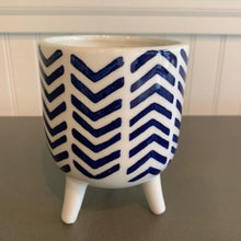 Load image into Gallery viewer, Blue Lagoon Candle in a ceramic footed container, navy chevron pattern on white background.  Lovely fragrance.

