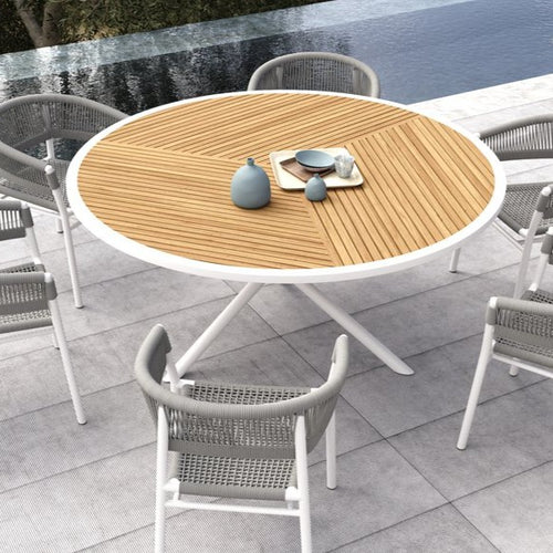Makena Collection round dining table, powder-coated aluminum frame and teak top.  Maui Modern Home, Wailea